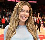 Brielle Biermann Shows off Fit Figure "Splashing the Day Away"