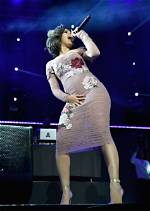 Cardi B Nearly Suffers a Nip Slip in Racy Photo from Bed