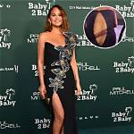 Chrissy Teigen Nearly Suffers Wardrobe Malfunction Leaving the ‘Time’ 100 Gala!