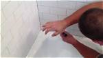How to Remove Grout from a Tub