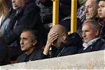 Managers’ Touchline and Stadium Bans: from Sitting in the Stands to Hiding in the Laundry
