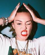 Miley Cyrus Poses Topless in Rolling Stone Shoot