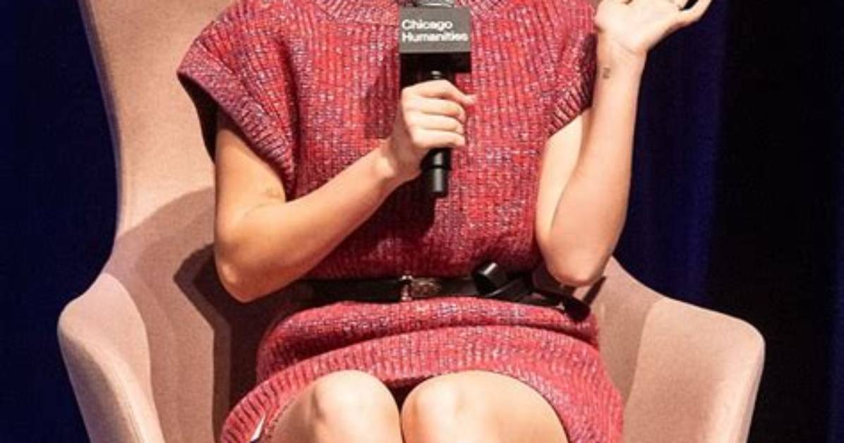 Millie Bobby Brown Puts on a Typically Animated Display While on Stage in a Knitted Mini Dress and Knee High Boots at the Chicago Humanities Festival