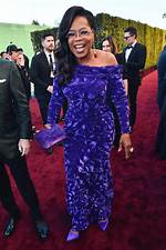 Oprah Winfrey Goes Purple in Louis Vuitton Dress at Golden Globes 2024