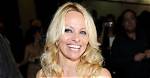 Pamela Anderson Shows off Her Famous Cleavage as Lindsay Lohan Dons Racy Corset at Glamorous Boat Party in Cannes