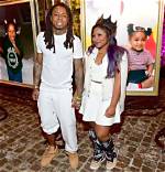 Photos: Reginae Carter Makes Her Parents Proud