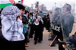 Pro-Palestinian Protesters Have Tense Standoff with Riot Police Outside Biden's Campaign Event in Michigan