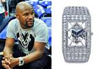 Watch: Floyd Mayweather Tattoos His Signature on the Man Who Holds the World Record for Most Signatures Tattooed on His Back